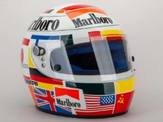 A Gerhard Berger Bieffe replica helmet with sponsors logos