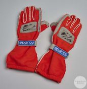 Pair of Mika Salo race used autographed Sparco gloves.