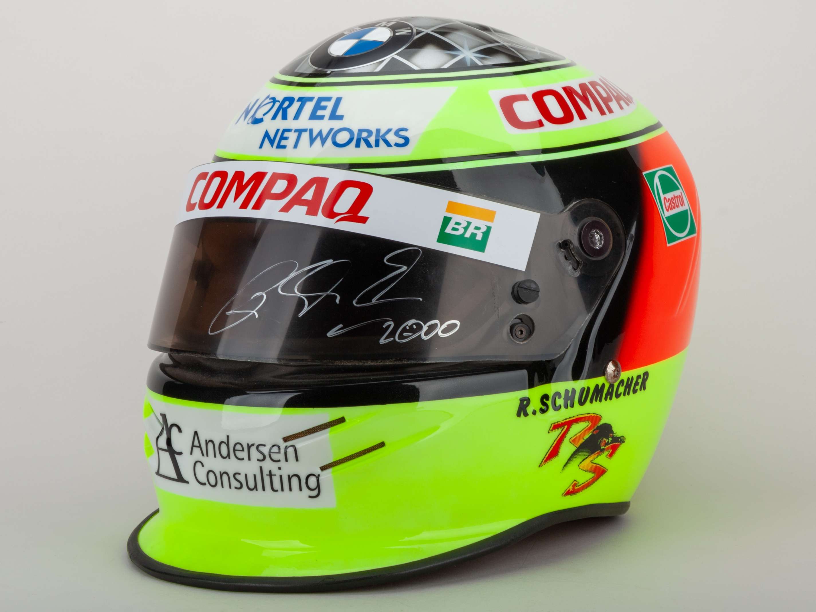 An autographed Ralf Schumacher Bell helmet.