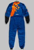 Fernando Alonso blue and yellow McLaren race suit.