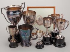 A group of eight Archie Butterworth motorsport trophies