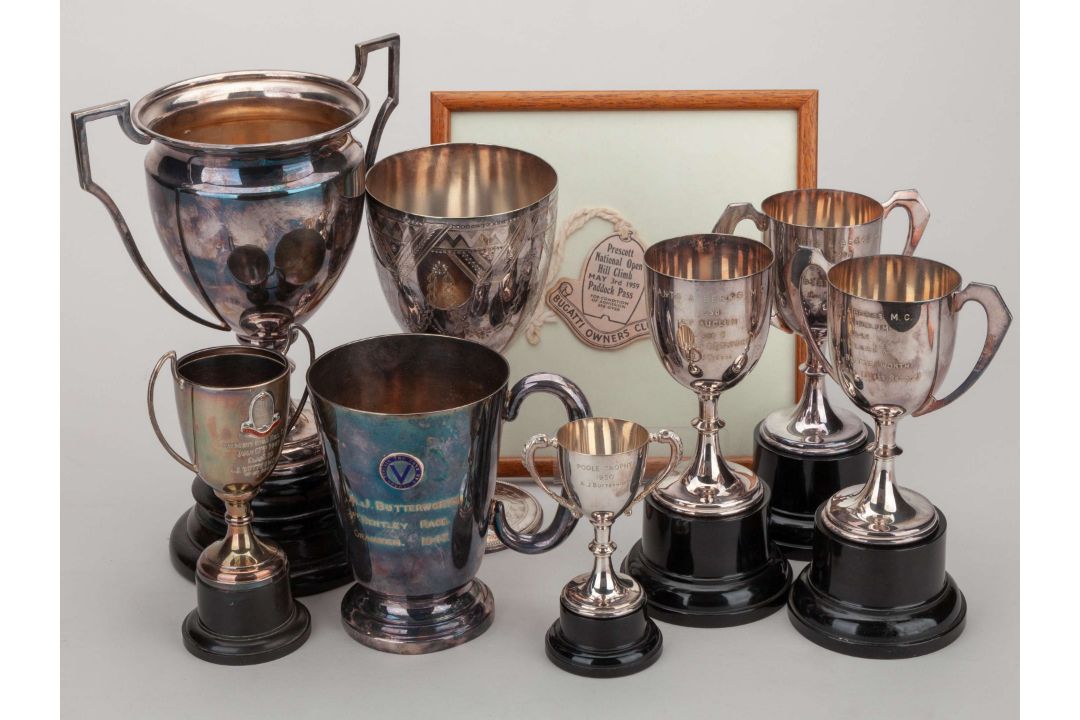 A group of eight Archie Butterworth motorsport trophies