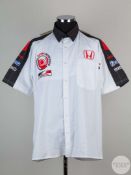 White, black and red BAR Honda F1 pit crew shirt.