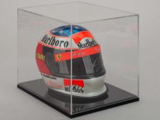 Michael Schumacher signed 1/2 scale 1996 helmet in display case.