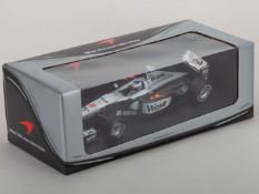 A Paul's Model Art 1:18 scale model of West McLaren Mercedes