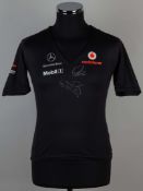 Lewis Hamilton and Jenson Button signed Vodafone McLaren signed t-shirt.
