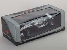 A Paul's Model Art 1:18 scale model of West McLaren Mercedes