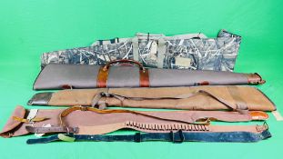 A GROUP OF FOUR GOOD QUALITY GUN SLIPS INCLUDING CANVAS, CAMO, ETC + .