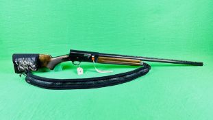 FABRIQUE NATIONALE 12 BORE SELF LOADING SHOTGUN, 28½ INCH BARREL, WEBBING SHOULDER STRAP,