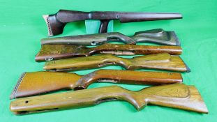 A GROUP OF 6 VARIOUS RIFLE STOCKS INCLUDING AIR ARMS, AGS,