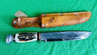 A GESCO BONE HANDLED HUNTING KNIFE WITH LEATHER SHEAF - NO POSTAGE OR PACKING AVAILABLE