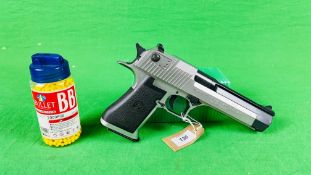 A MAGNUM RESEARCH 6MM BB GUN WITH MAGAZINE AND BBs DESERT EAGLE .