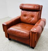 A VINTAGE TAN LEATHER BUTTON BACK EASY CHAIR.