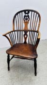 A WHEEL BACK WINDSOR ARM CHAIR WITH 