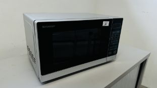 A SHARP MICROWAVE OVEN - SOLD AS SEEN.