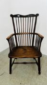 A STICK BACK COMB BACK ARM CHAIR WITH ELM WOOD SEAT.