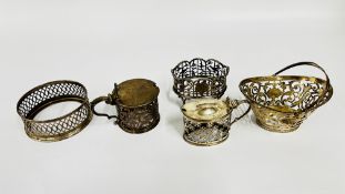 A GROUP OF FIVE SILVER PIECES ALL OF PIERCED DESIGN, LACKING GLASS LINERS, SILVER CIRCULAR MUSTARD,