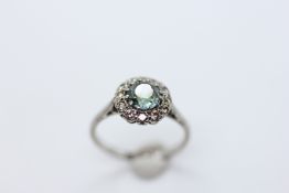 A LADY'S 18CT WHITE GOLD AND PLATINUM SET DRESS RING,