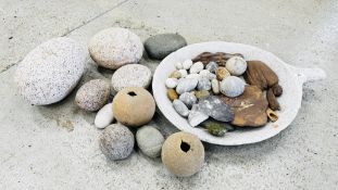 A LARGE HAND CARVED GRANITE HANDLED DISH ALONG WITH AN ASSORTMENT OF VARIOUS ROCKS AND STONES,