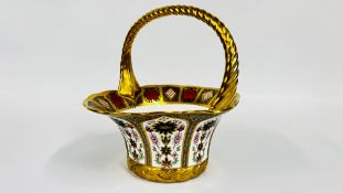 A ROYAL CROWN DERBY IMARI FRUIT BASKET WITH GILDED ROPE TWIST HANDLE (1121) W 26 X D 21 X H 24CM.