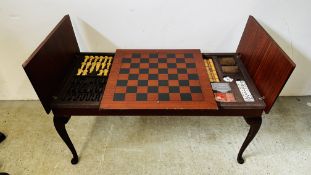 GAMES TABLE WITH CHESS SET AND CARD GAME.