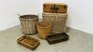 A LARGE WICKER BASKET / TRUNK W 69CM D 57CM H 60CM ALONG WITH A LARGE CYLINDRICAL WICKER LOG BASKET