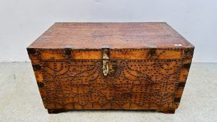 A HARDWOOD BOUND TRUNK WITH STUDDED DETAIL AND FITTED INTERIOR COMPARTMENTS W 91CM D 52CM H 52CM.