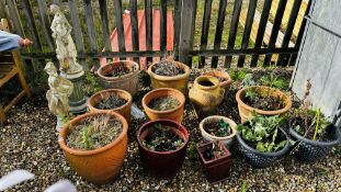 A GROUP OF ASSORTED MAINLY TERRACOTTA GARDEN PLANTERS ALONG WITH TWO STONEWORK GARDEN FIGURES AND