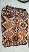 A KILIM FLAT WEAVE RUG, 102CM X 143CM, ALONG WITH ONE OTHER HAND KNOTTED RUG ON BLUE BACKGROUND,