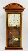 A MODERN WESTMINSTER CHIMING WALL CLOCK BY KIENINGER.