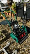 A QUALCAST PETROL DRIVEN CYLINDER MOWER WITH SCARIFIER (NO GRASS BOX).