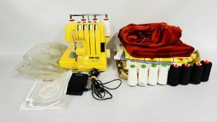 A BABY LOCK 750DSA ELECTRIC CUT OUT OVERLOCKER SEWING MACHINE COMPLETE WITH VARIOUS SPOOLS OF