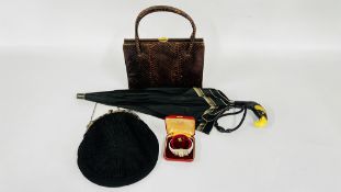 A 1920'S CELLULOID HANDLED UMBRELLA, COCKTAIL WATCH, A VINTAGE SKIN BAG AND ONE OTHER.