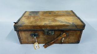 AN ANTIQUE CANVAS AND LEATHER BOUND CARTRIDGE CASE (REQUIRES RESTORATION)