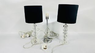 A PAIR OF DESIGNER SHAPED TABLE LAMPS WITH SHADES AND ONE FURTHER SIMILAR - SOLD AS SEEN.