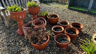 A GROUP OF TERRACOTTA PLANTERS TO INCLUDE HALF ROUND AND PEDESTAL EXAMPLE A/F (11).