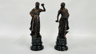 A PAIR OF SPELTER FIGURES OF LOWER GIRLS - APPROX 32.5 CM HIGH.