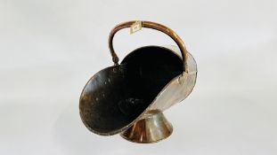 A C19TH COPPER HELMET SHAPED SCUTTLE.