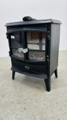 A DIMPLEX SOLID FUEL ELECTRIC ROOM HEATER WITH REMOTE - SOLD AS SEEN.