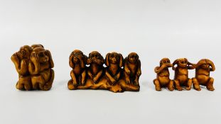 THREE CARVED MONKEY GROUPS WITH MONOGRAMS.
