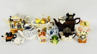 A COLLECTION OF NOVELTY TEAPOTS TO INCLUDE THE VILLAGE COLLECTIBLES, TONY CARTER,