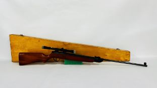 A VINTAGE SUHL .22 MODEL 302 BREAK BARREL AIR RIFLE FITTED WITH MIKKO STIRLING SIGHT - SOLD AS SEEN.