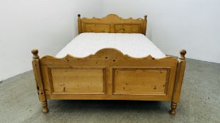 A WAXED PINE DOUBLE BEDSTEAD COMPLETE WITH COMFILUX MILAN MATTRESS.