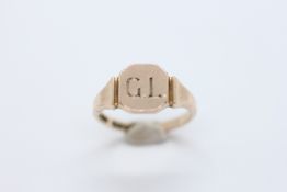 A 9CT GOLD MONOGRAM SIGNET RING.