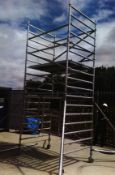 AN 8 SECTION ALUMINIUM TOWER SCAFFOLD WITH OUTRIGGER PLATFORM, 8 X PLATFORM SECTIONS,