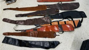 A GROUP OF 10 VARIOUS GUN SLIPS.