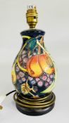 A MOORCROFT POTTERY QUEENS CHOICE LAMP BASE, BEARING TURNED WOODEN BASE H 21.5CM.