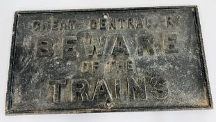 A CAST PLAQUE TITLED 