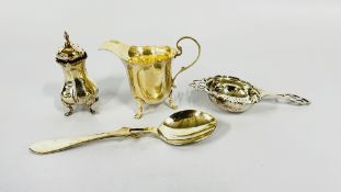 A SILVER CREAM JUG, BIRMINGHAM ASSAY A/F, SILVER PEPPER POT (RUBBED MARKS), TEA STRAINER,