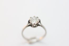 A PLATINUM SOLITAIRE DIAMOND RING, THE SPREAD OF THE STONE APPROX 7MM.